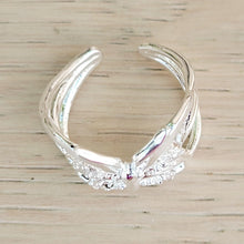 Load image into Gallery viewer, Adjustable butterfly ring on a tan background.