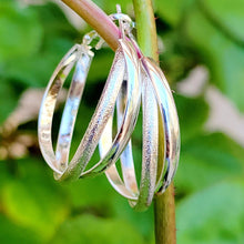 Load image into Gallery viewer, Criss Cross Silver Hoop Earrings