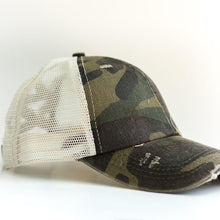 Load image into Gallery viewer, Camo Distressed Ponytail & Messy Bun Baseball Cap side view with a white background