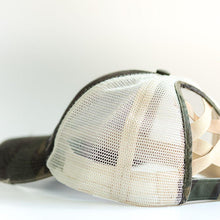Load image into Gallery viewer, Camo Distressed Ponytail & Messy Bun Baseball Cap side view with a white background