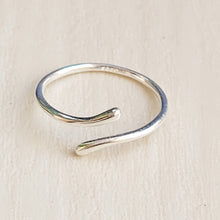 Load image into Gallery viewer, Picture of Geometric Adjustable Sterling Silver Ring on a tan background