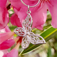 Load image into Gallery viewer, Slanted Butterfly Sterling Silver Necklace with pink flowers.