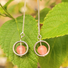 Load image into Gallery viewer, Picture of Box Chain Strawberry Dangle Sterling Silver Earrings with green leaves in the background.