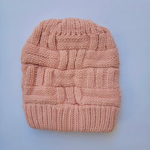 Load image into Gallery viewer, Pink Ponytail & Messy Bun Knit Beanie front view on a white background.