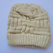 Load image into Gallery viewer, Cream Ponytail & Messy Bun Knit Beanie front view on a white background.