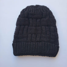 Load image into Gallery viewer, Black Ponytail & Messy Bun Knit Beanie front view on a white background.