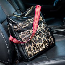 Load image into Gallery viewer, Leopard black convertible bag in a car with black seats