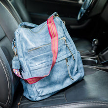Load image into Gallery viewer, Blue convertible bag in a car with black seats