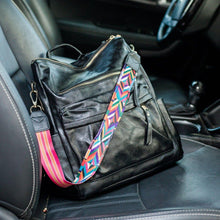 Load image into Gallery viewer, Black convertible bag in a car with black seats