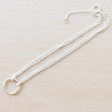 Load image into Gallery viewer, Double Strand Circle Sterling Silver Bracelet on a tan background. 
