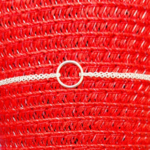 Load image into Gallery viewer, Double Strand Circle Sterling Silver Bracelet on a red mesh background.
