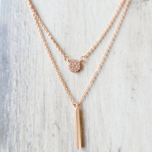 Load image into Gallery viewer, Rose Gold Disc and Bar Necklace with grey background. 
