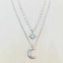 Load image into Gallery viewer, Star and Crescent Moon Double Strand Necklace on a tan background. 
