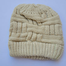 Load image into Gallery viewer, Cream Ponytail &amp; Messy Bun Knit Beanie front view on a white background.
