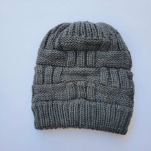 Load image into Gallery viewer, Grey Ponytail &amp; Messy Bun Knit Beanie front view on a white background.
